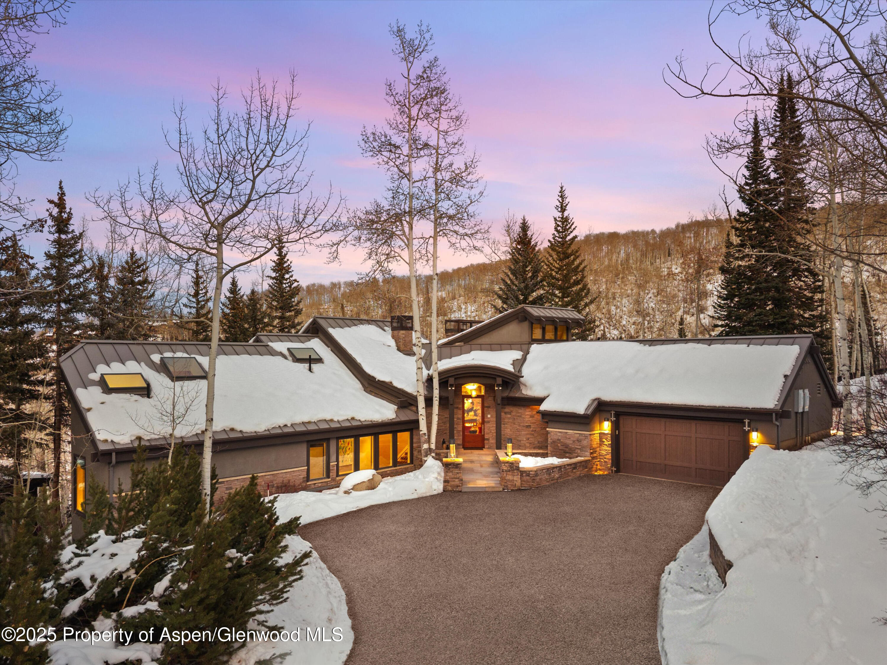 1248 Wood Road Snowmass Village, CO 81615 - Photo 2 of 43 a view of a street in front of the house