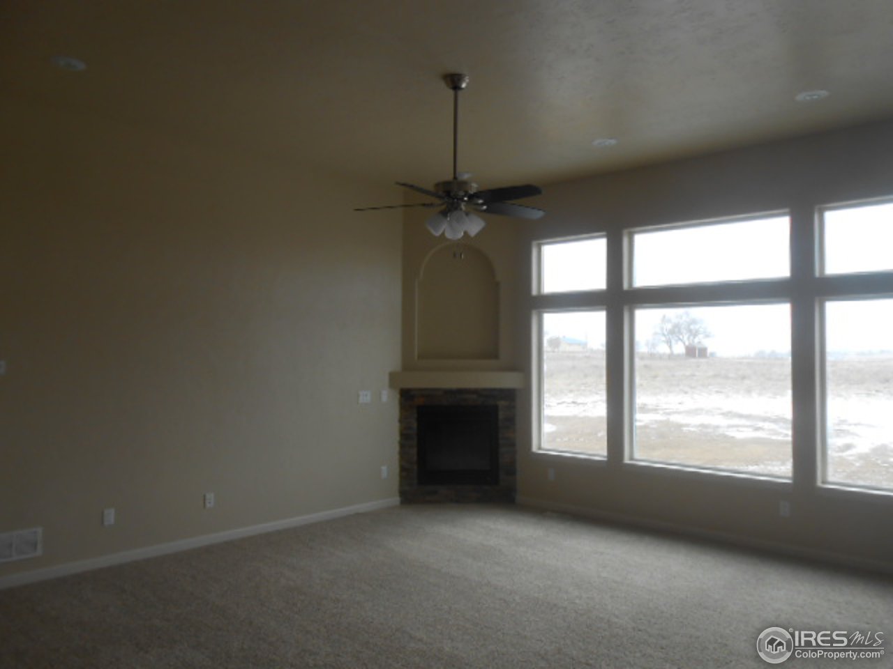 7850 Rd P.3 Wiggins, CO 80654 - Photo 4 of 24 Living room w/11' ceilings