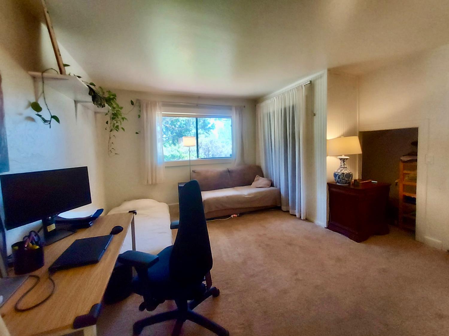 6880 Kahala Road Garden Valley, CA 95633 - Photo 13 of 52 a living room with furniture and a flat screen tv