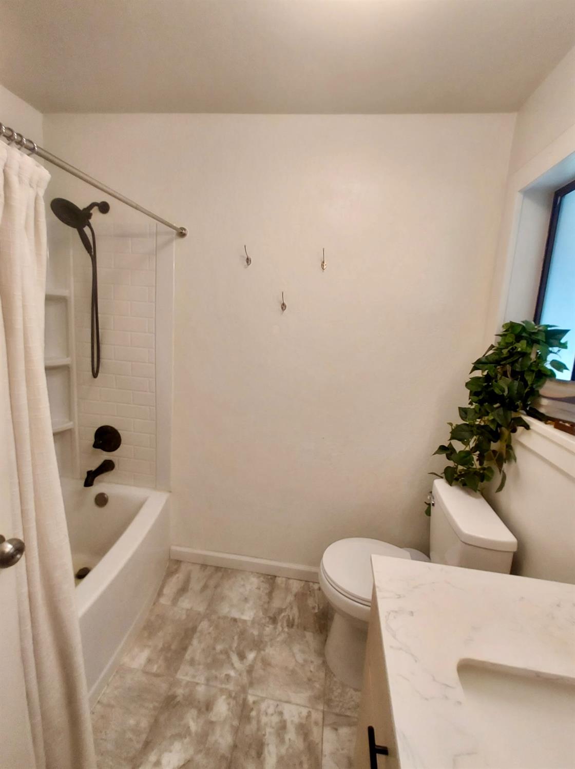 6880 Kahala Road Garden Valley, CA 95633 - Photo 14 of 52 a bathroom with a toilet and a shower