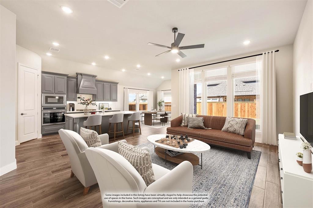 14426 McClint Street Pilot Point, TX 76258 - Photo 9 of 34 a living room with furniture and kitchen view