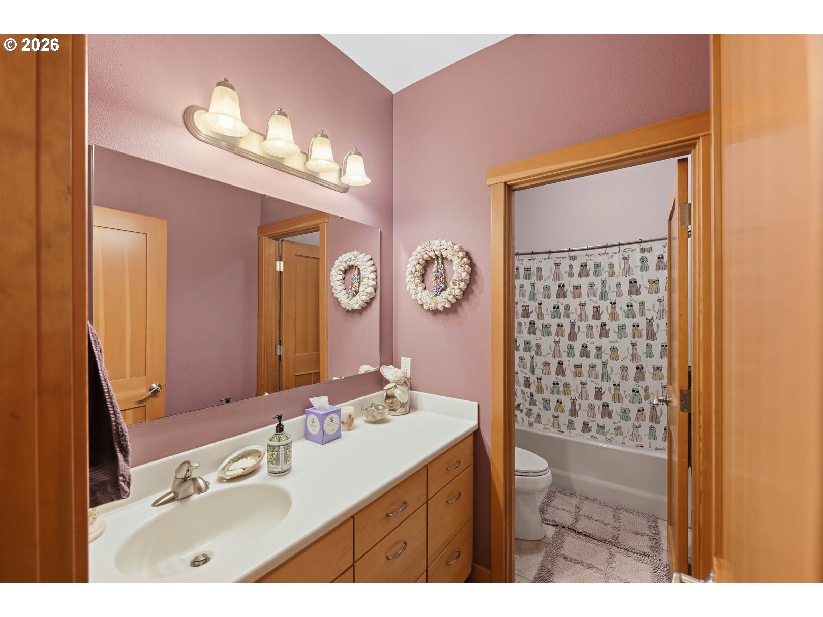 62736 Olive Barber Road Coos Bay, OR 97420 - Photo 18 of 25 a bathroom with a sink vanity mirror and a bathtub