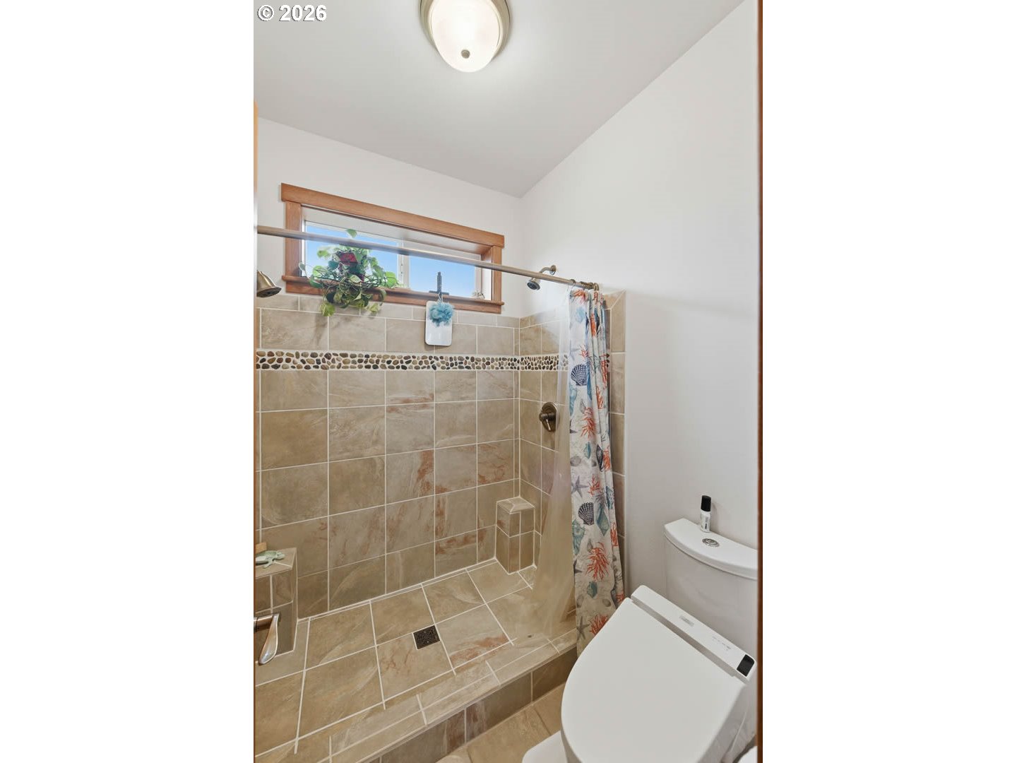 62736 Olive Barber Road Coos Bay, OR 97420 - Photo 23 of 25 a bathroom with a shower toilet and sink