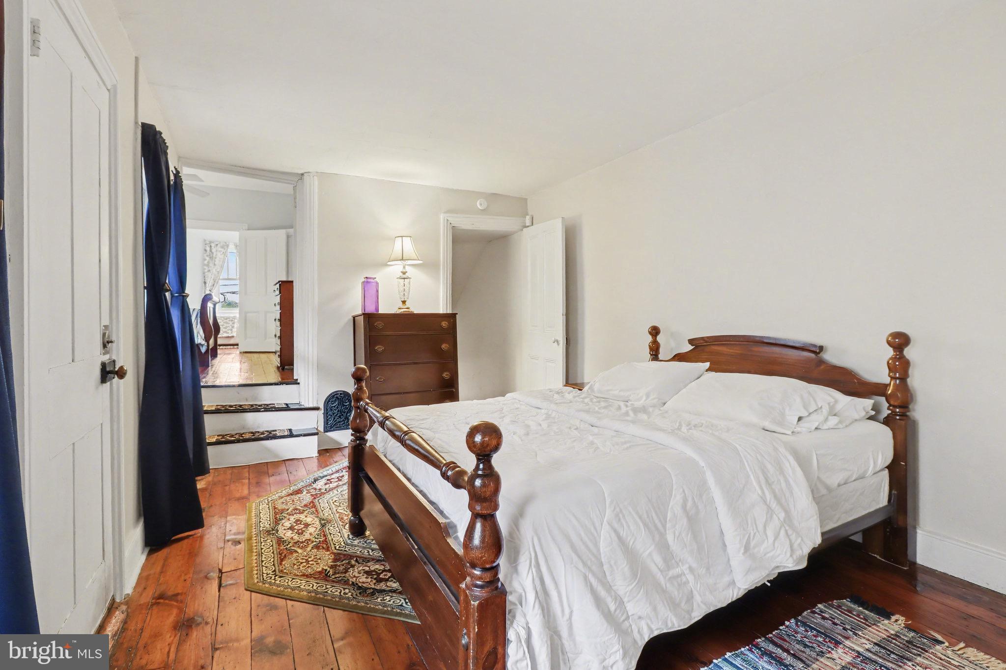 329 South Front Street Harrisburg, PA 17104 - Photo 12 of 27 a bed room with a bed and a television