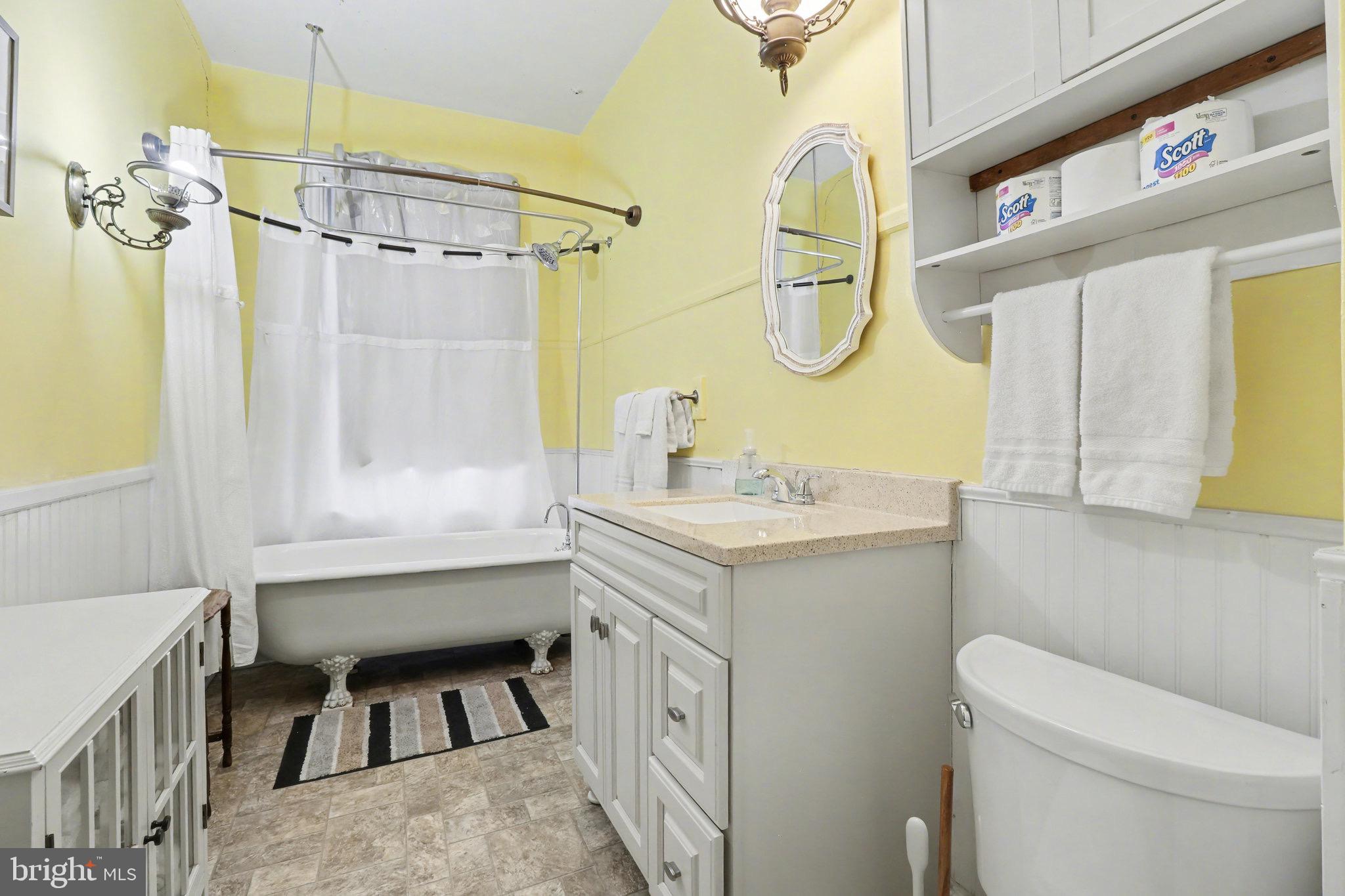 329 South Front Street Harrisburg, PA 17104 - Photo 16 of 27 a bathroom with a sink a toilet and a mirror
