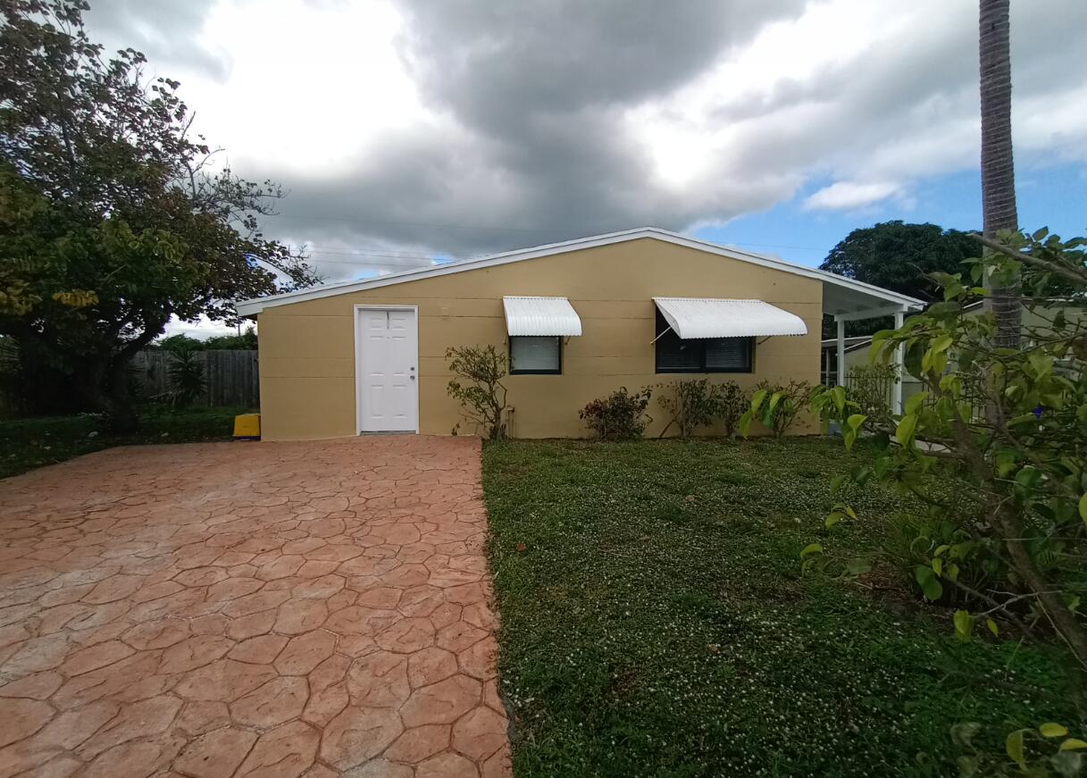 1080 West 27th Street Riviera Beach, FL 33404 - Photo 1 of 1 FRONT OF HOUSE