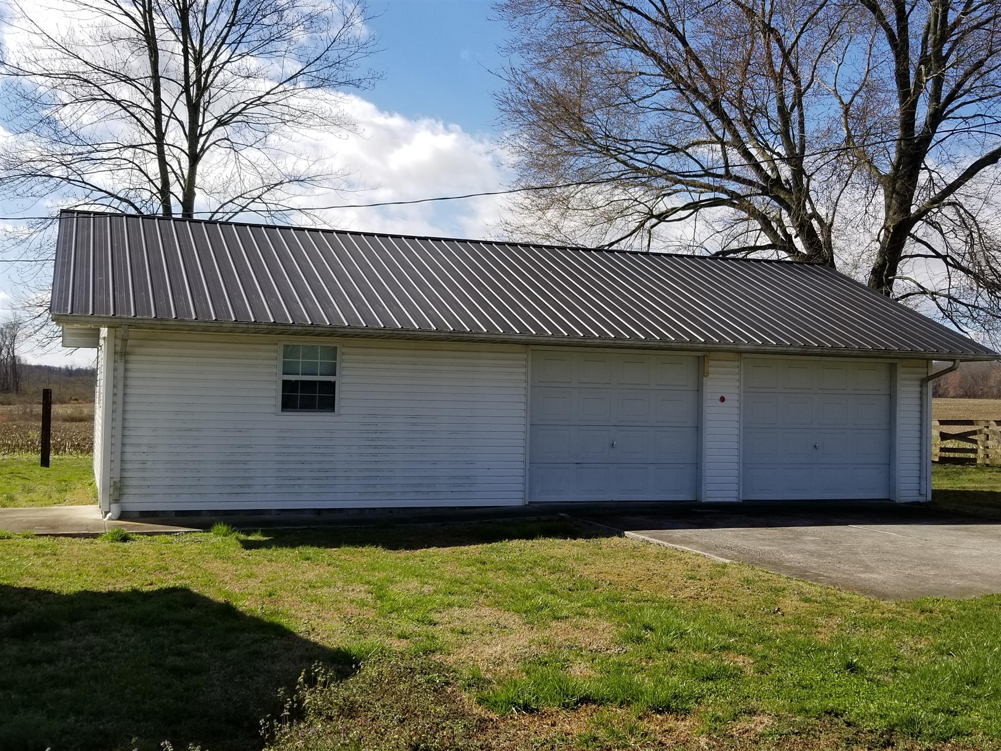 1309 Smith Road Manchester, TN 37355 - Photo 14 of 18 a front view of a house having yard