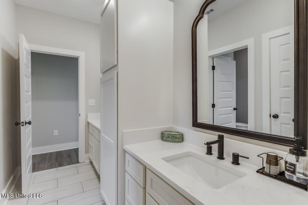 16043 West Dedeaux Road Gulfport, MS 39503 - Photo 30 of 50 Guest Bathroom vanities