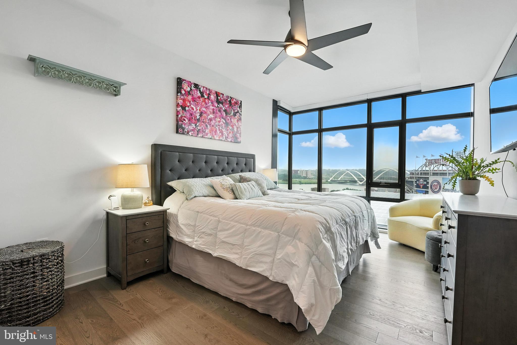 70 N Street Southeast, Unit N913 Washington, DC 20003 - Photo 11 of 77 a bedroom with a large bed and a window