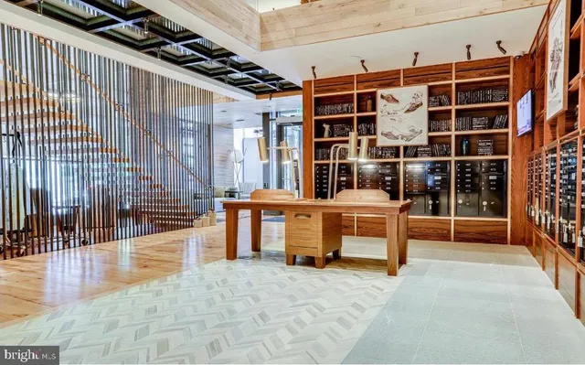 a view of a patio with couches table and chairs and potted plants