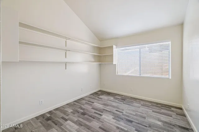 a view of a room that has a window in it