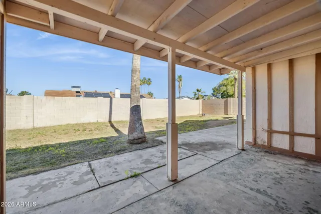 a house view with a backyard space