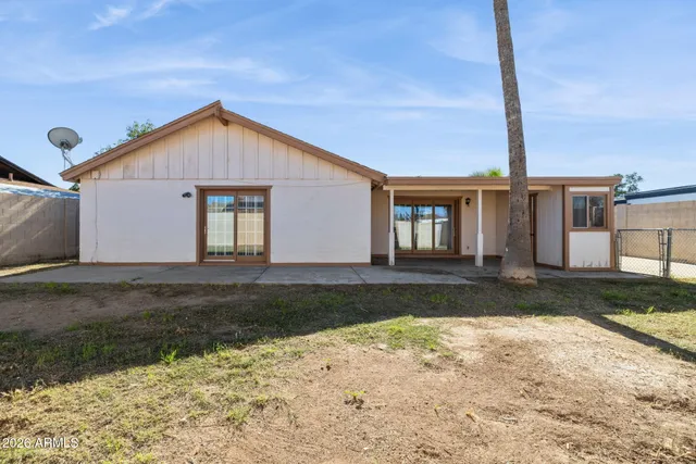 a bathroom with a toilet shower tub and sink
