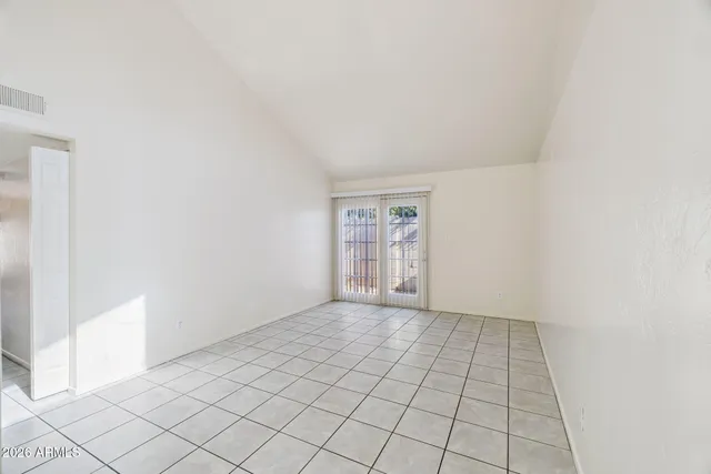 a view of an empty room and window