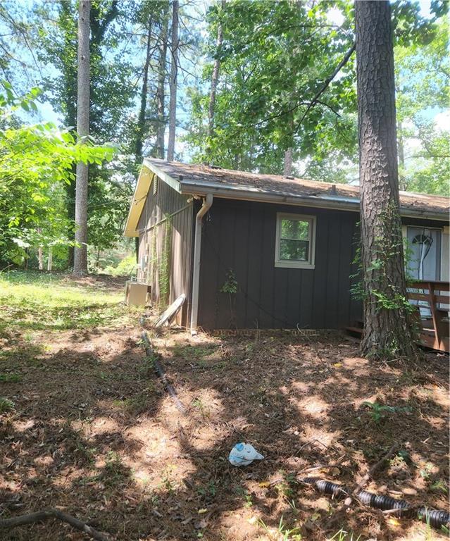 3389 Boring Road Decatur, GA 30034 - Photo 6 of 14 a backyard of a house with table and chairs