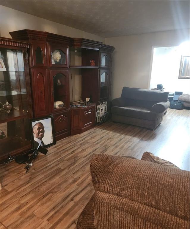 3389 Boring Road Decatur, GA 30034 - Photo 7 of 14 a bedroom with a bed and lamp with window