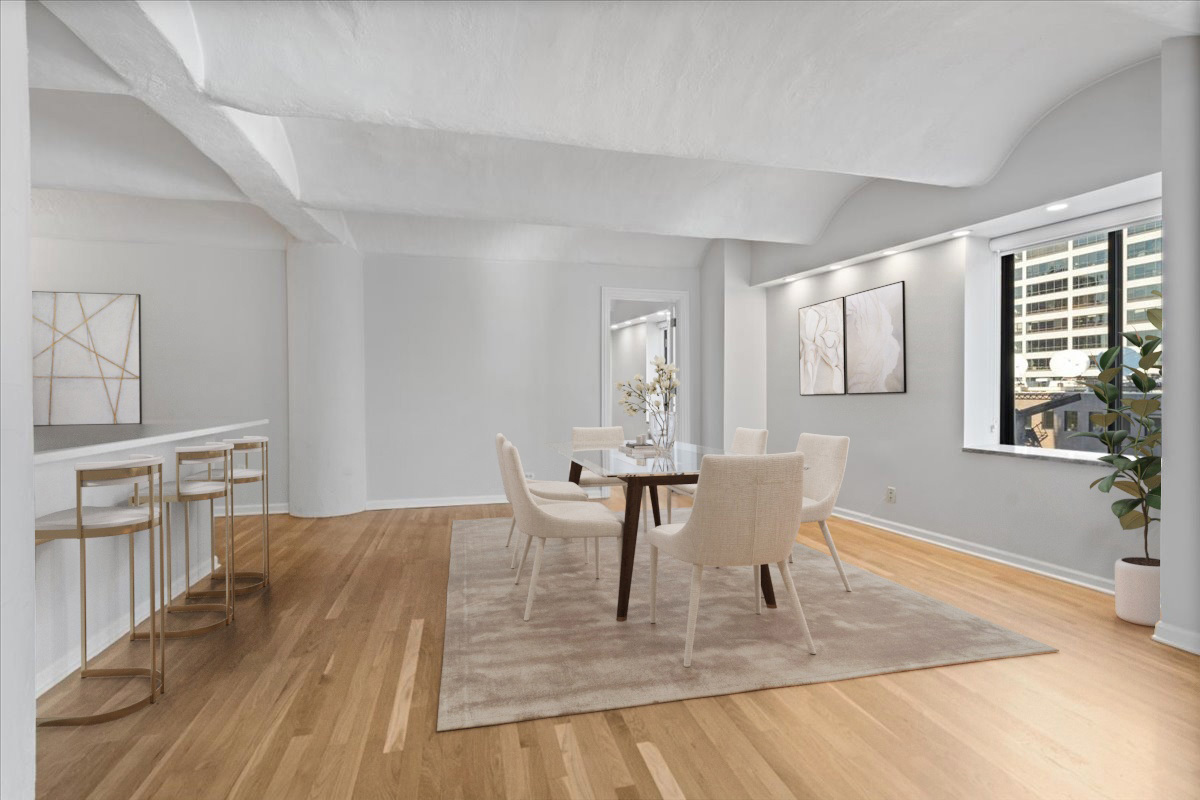 345 North Canal Street, Unit 608 Chicago, IL 60606 - Photo 16 of 27 a view of a dining room with furniture and wooden floor