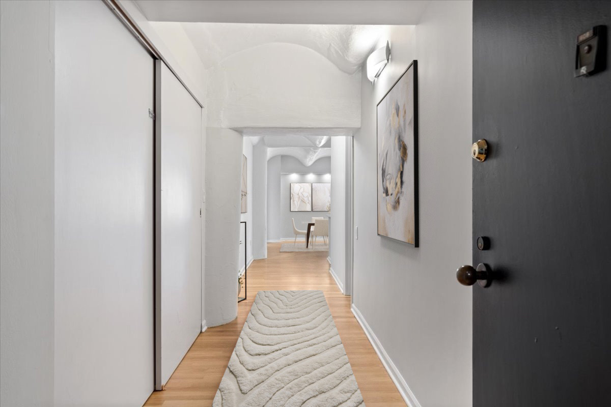 345 North Canal Street, Unit 608 Chicago, IL 60606 - Photo 2 of 27 a view of a hallway with wooden floor and staircase