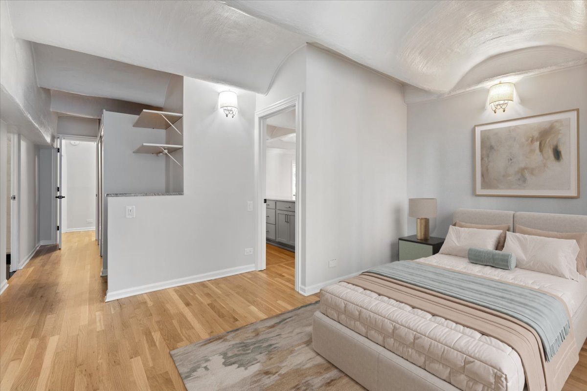 345 North Canal Street, Unit 608 Chicago, IL 60606 - Photo 23 of 27 a bedroom with a bed and a painting on the wall