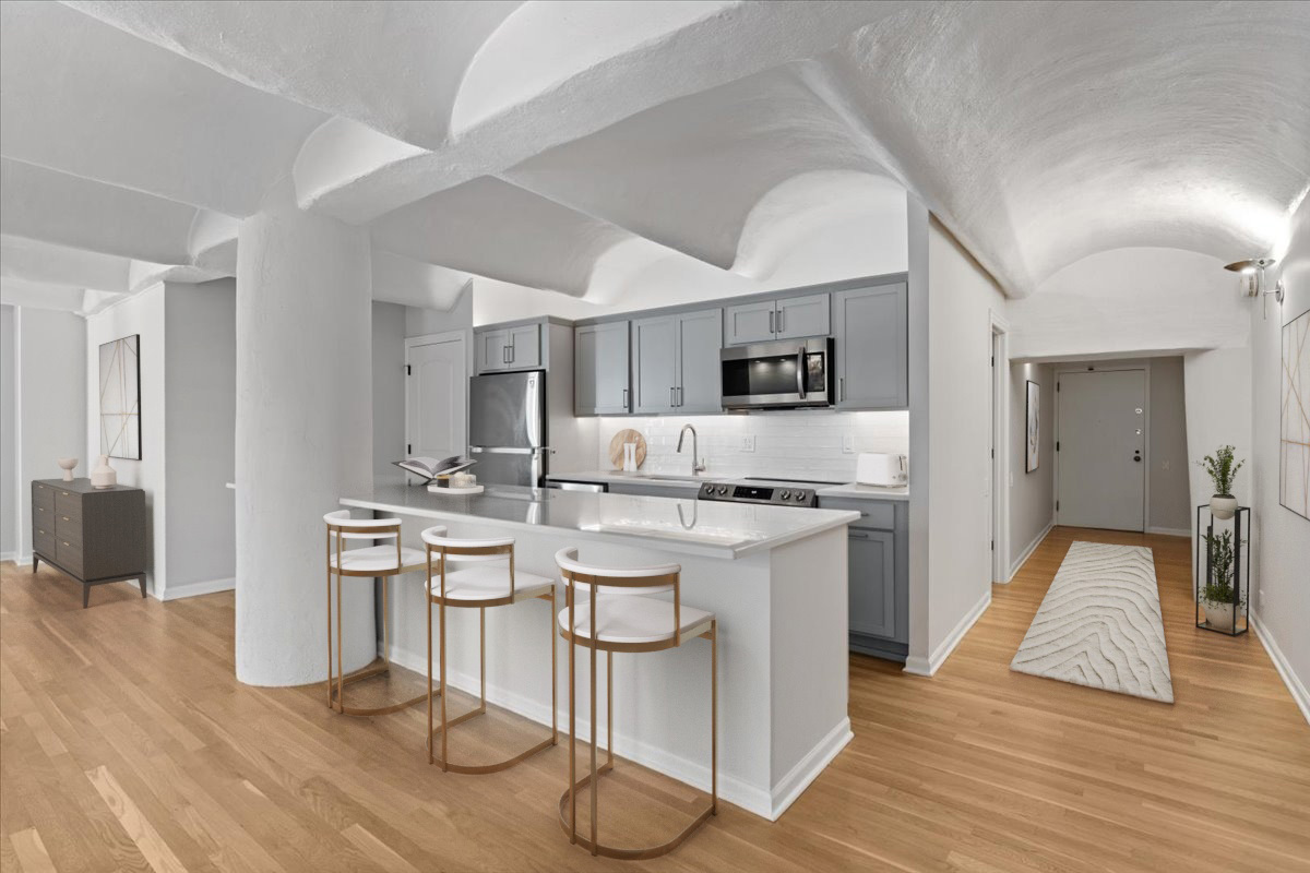 345 North Canal Street, Unit 608 Chicago, IL 60606 - Photo 4 of 27 a kitchen with stainless steel appliances a stove a sink dishwasher and a refrigerator