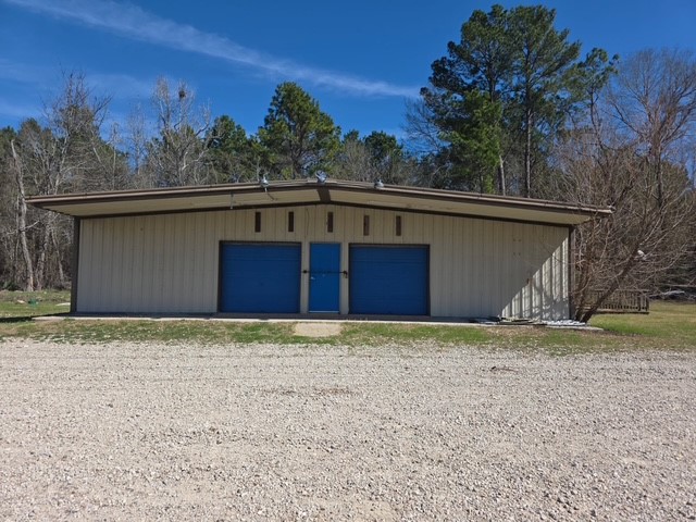 a house with trees in the background
