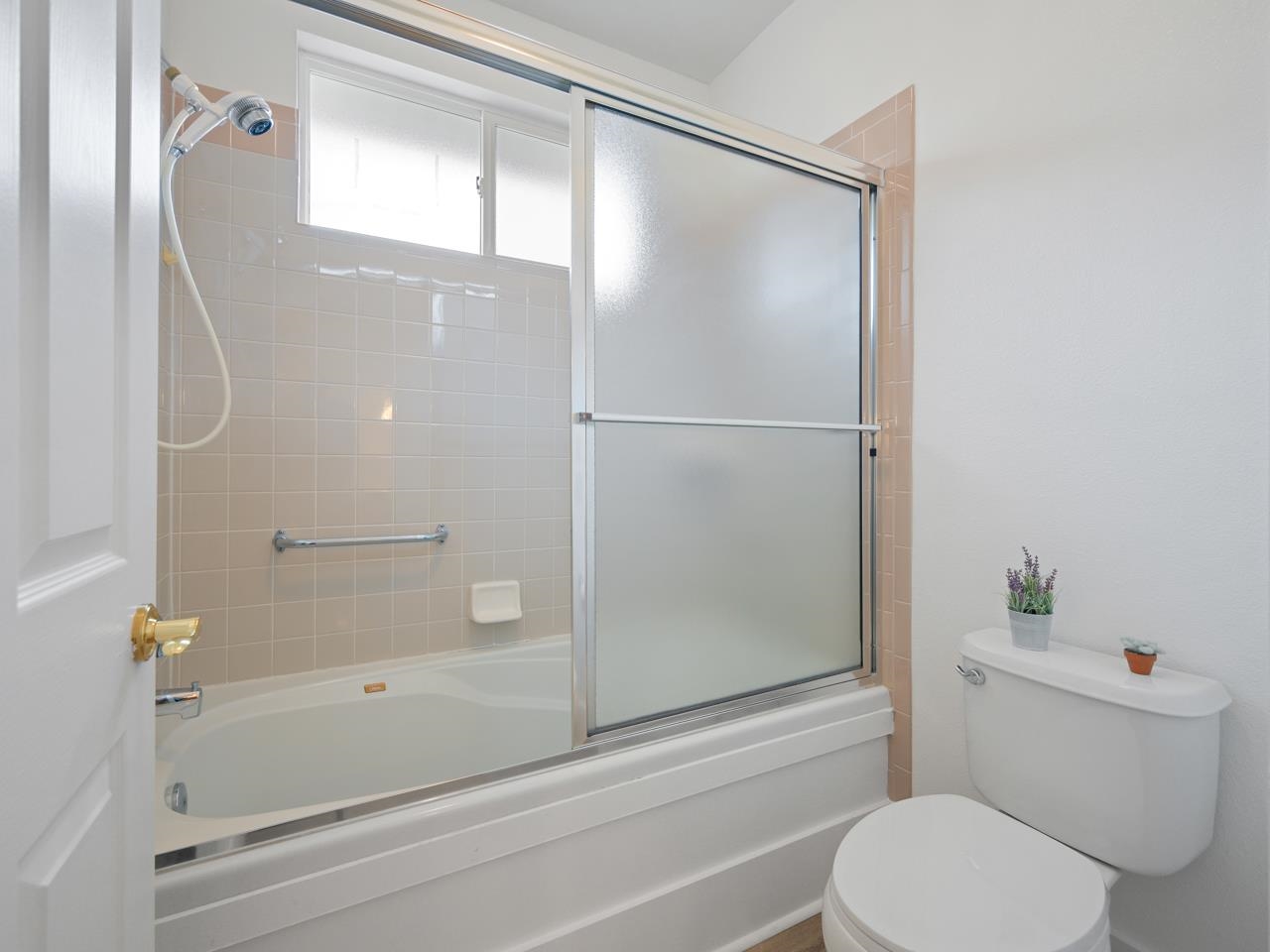 1117 Buttercup Lane Fruita, CO 81521 - Photo 18 of 25 a bathroom with a shower and a toilet