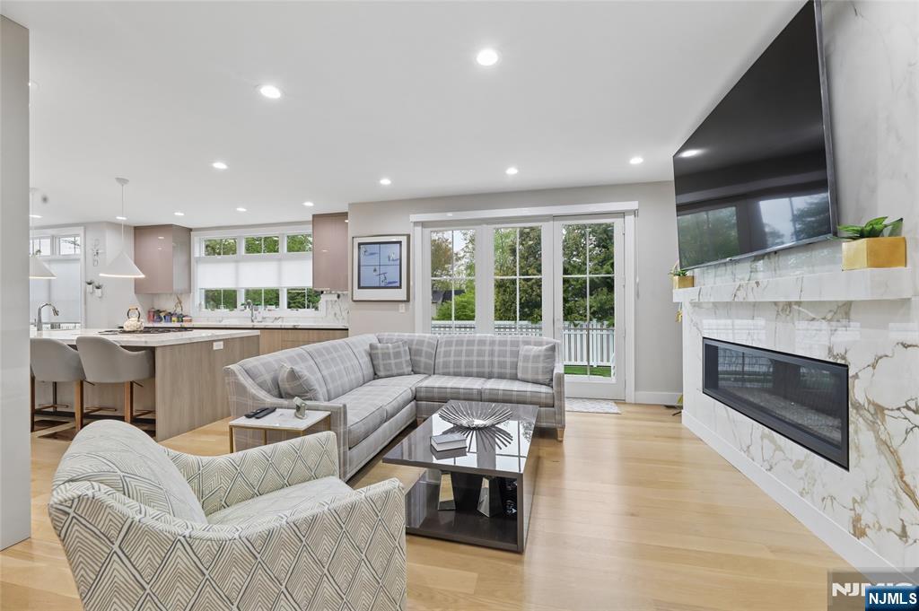 31 Engleside Street Cresskill, NJ 07626 - Photo 7 of 49 a living room with furniture and a fireplace