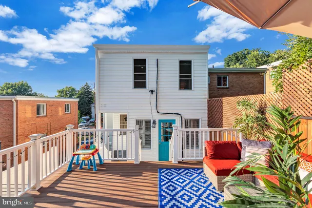 a view of a backyard with a patio