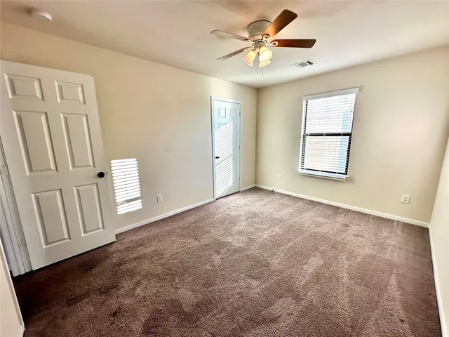 a bathroom with a bathtub sink mirror and toilet