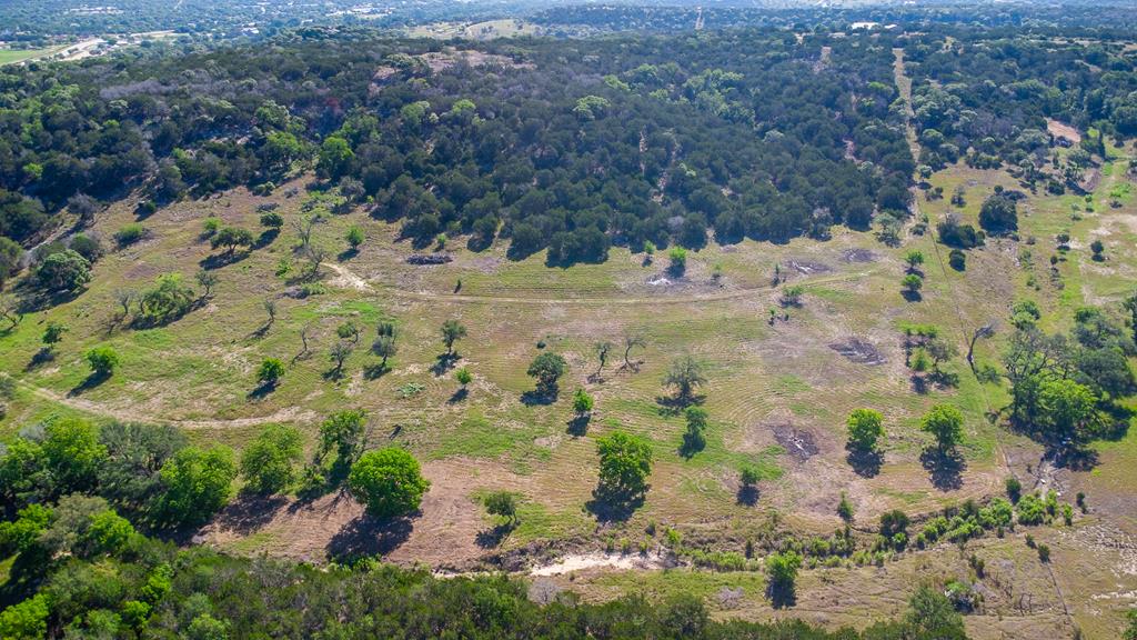 Lot 29 River Valley Road South Ingram, TX 78025 - Photo 1 of 12 a view of a yard with a house