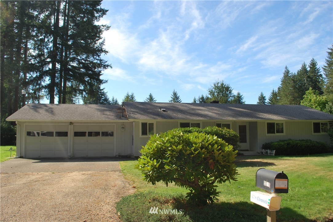 5205 185th Avenue Southwest Rochester, WA 98579 - Photo 13 of 17 a front view of a house with garden