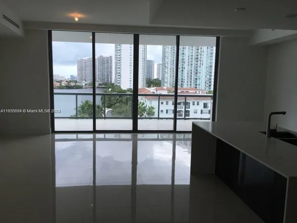 a bathroom with a large window
