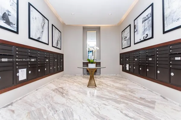 a bedroom with a bed and a cabinets