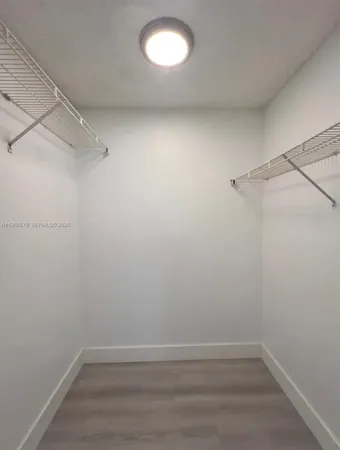 a view of a room with racks on the wall