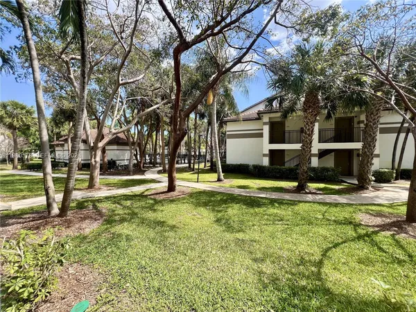 a view of a house with swimming pool