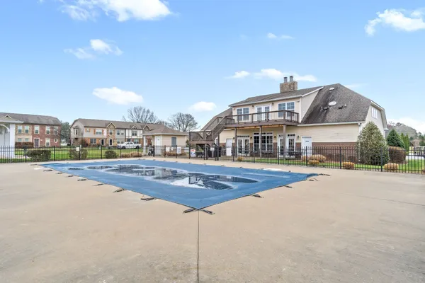 a big room with lots of green space