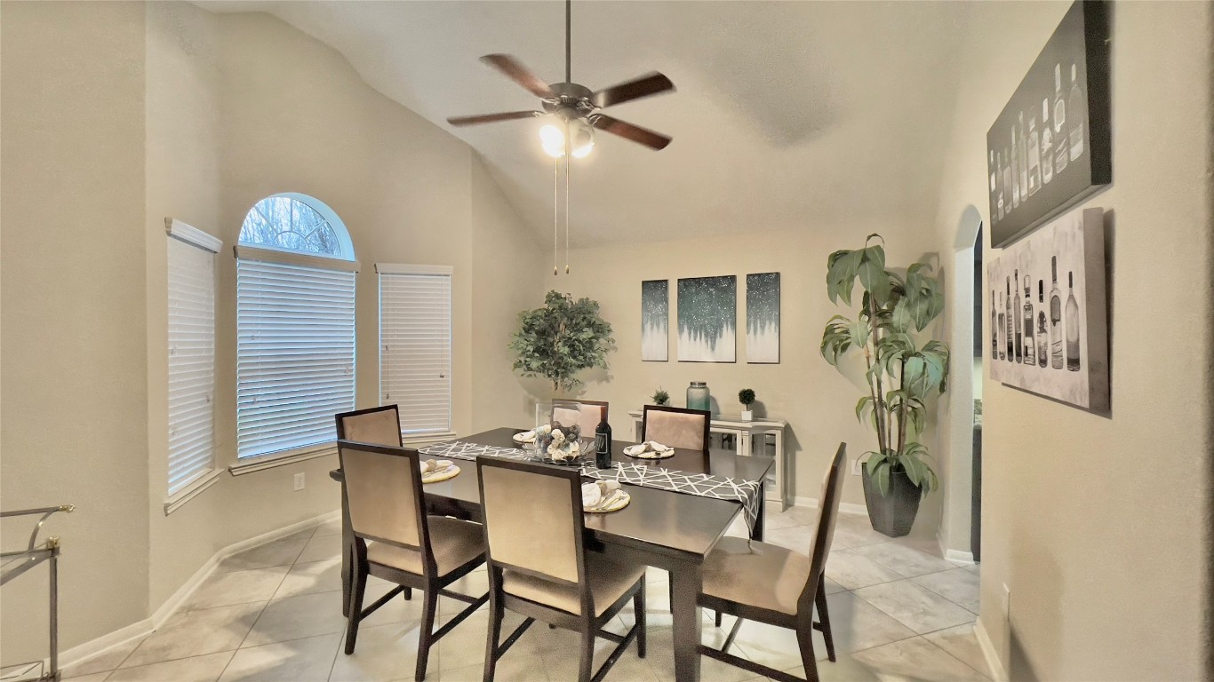 21618 Ivory Gate Lane Katy, TX 77449 - Photo 14 of 32 a dining room with furniture and window