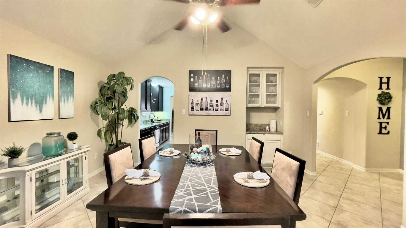21618 Ivory Gate Lane Katy, TX 77449 - Photo 16 of 32 a view of a dining room with furniture and wooden floor