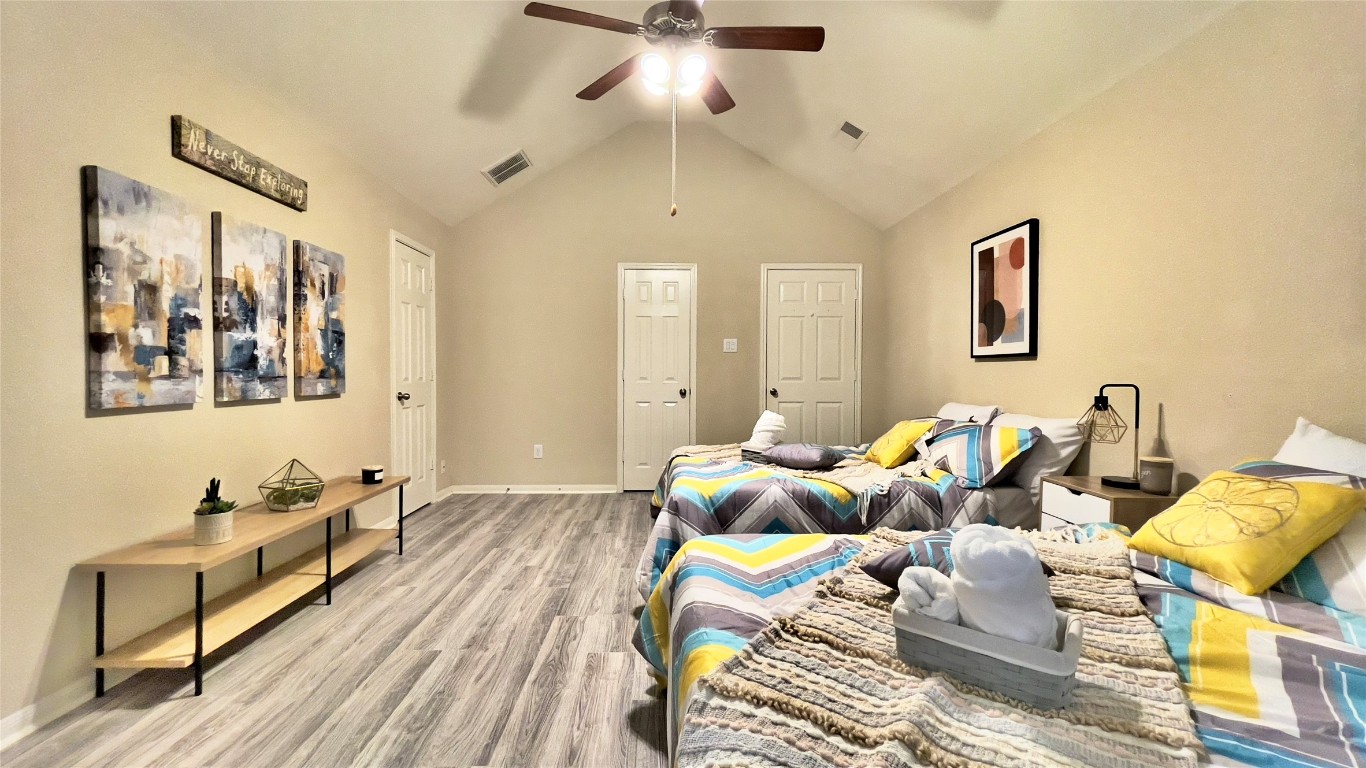 21618 Ivory Gate Lane Katy, TX 77449 - Photo 25 of 32 a living room with furniture and wooden floor