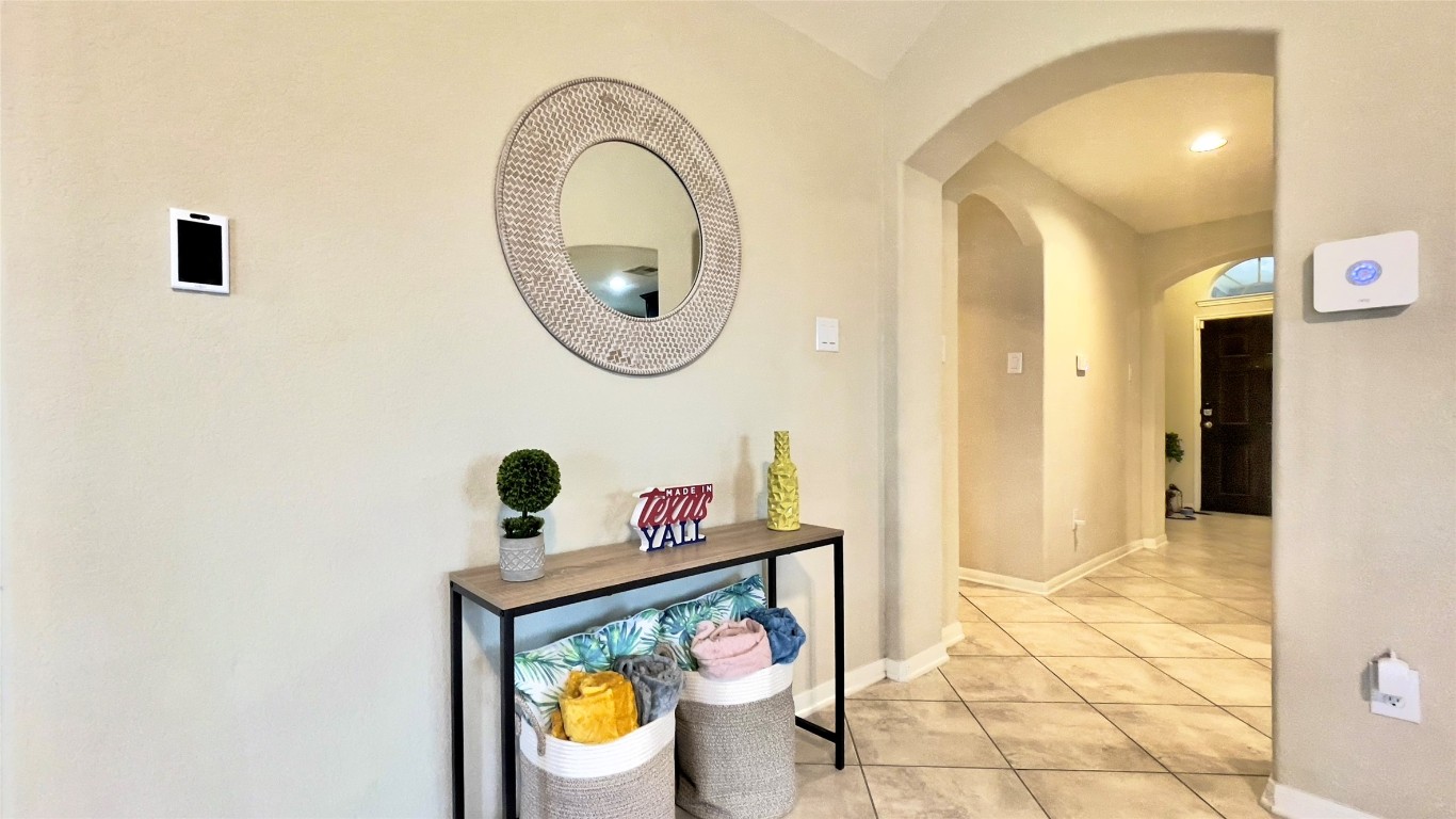 21618 Ivory Gate Lane Katy, TX 77449 - Photo 29 of 32 a bathroom with a sink mirror and vanity