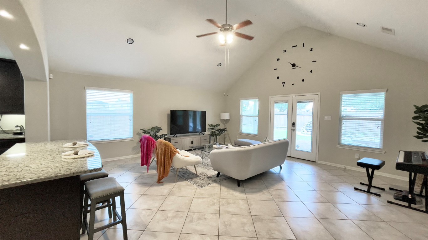 21618 Ivory Gate Lane Katy, TX 77449 - Photo 5 of 32 a living room with furniture and a flat screen tv