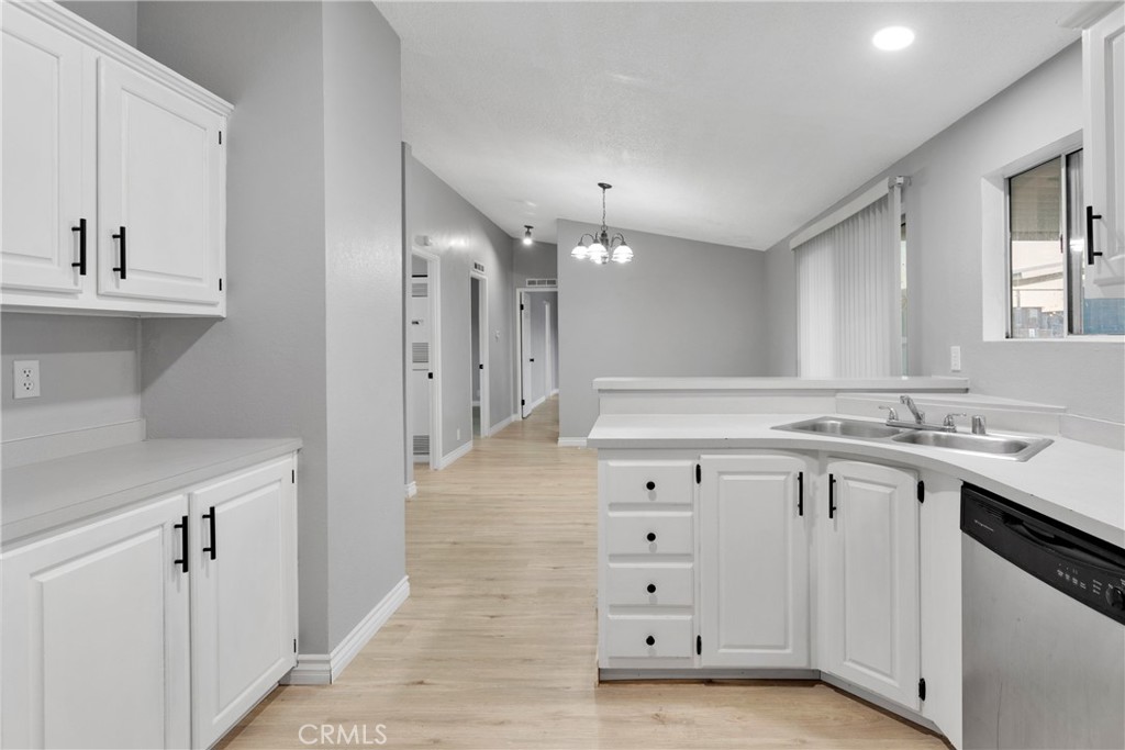 8450 G Avenue, Unit 63 Hesperia, CA 92345 - Photo 15 of 31 a bathroom with a sink vanity and a mirror
