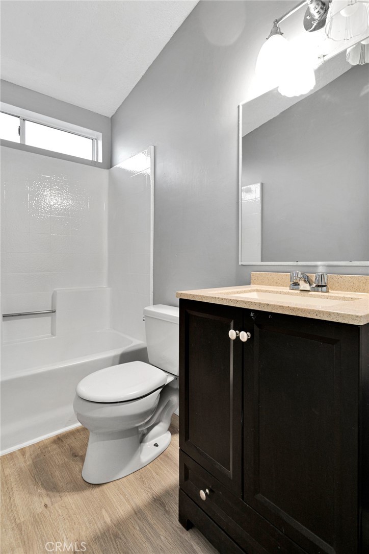 8450 G Avenue, Unit 63 Hesperia, CA 92345 - Photo 26 of 31 a bathroom with a sink and a toilet