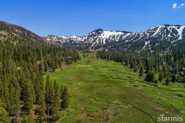 a picture of a room with a white bench