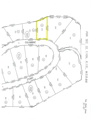 a view of a yard with trees