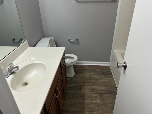 a bathroom with a sink and toilet