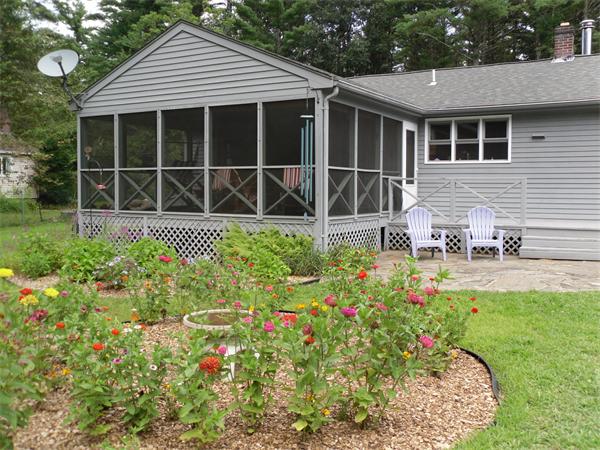 18 Barker Hill Road Townsend, MA 01469 - Photo 17 of 22 a house view with a garden space