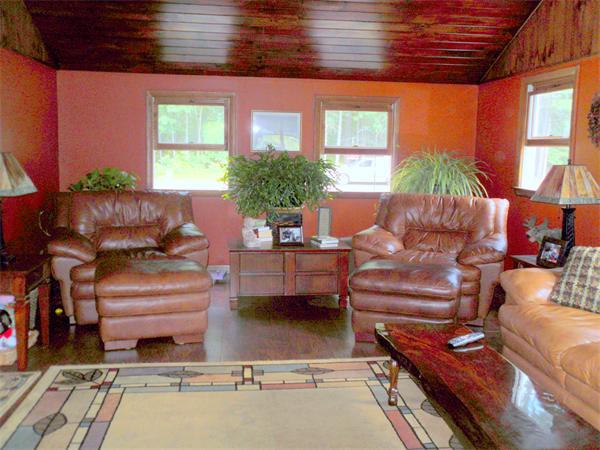 18 Barker Hill Road Townsend, MA 01469 - Photo 8 of 22 a living room with furniture and a dining table
