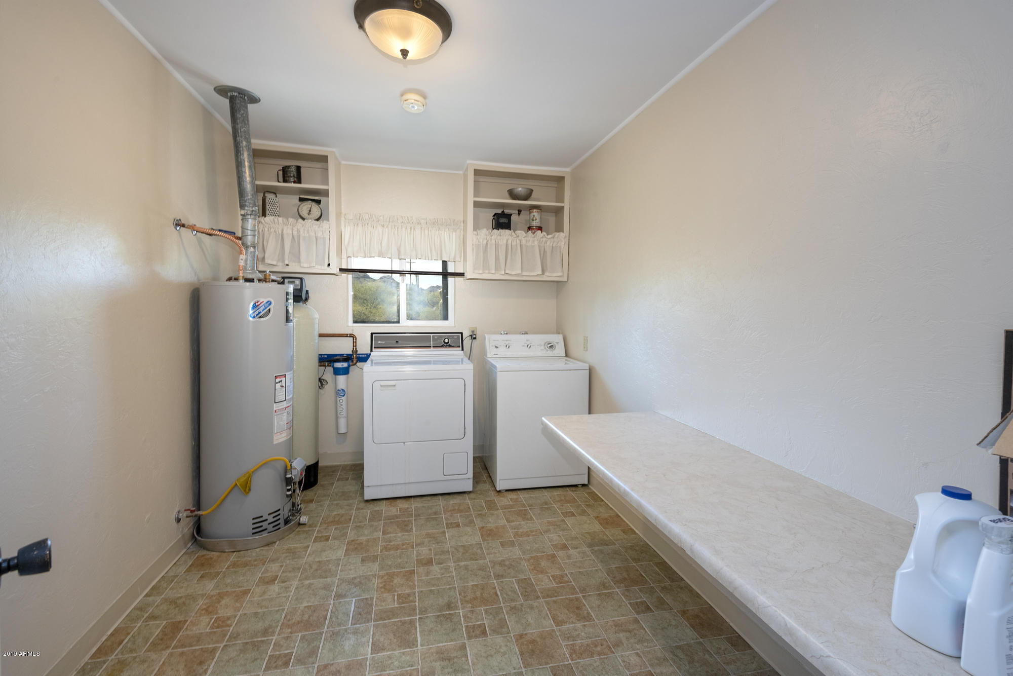 7350 North Wade Road Tucson, AZ 85743 - Photo 29 of 40 Laundry Room