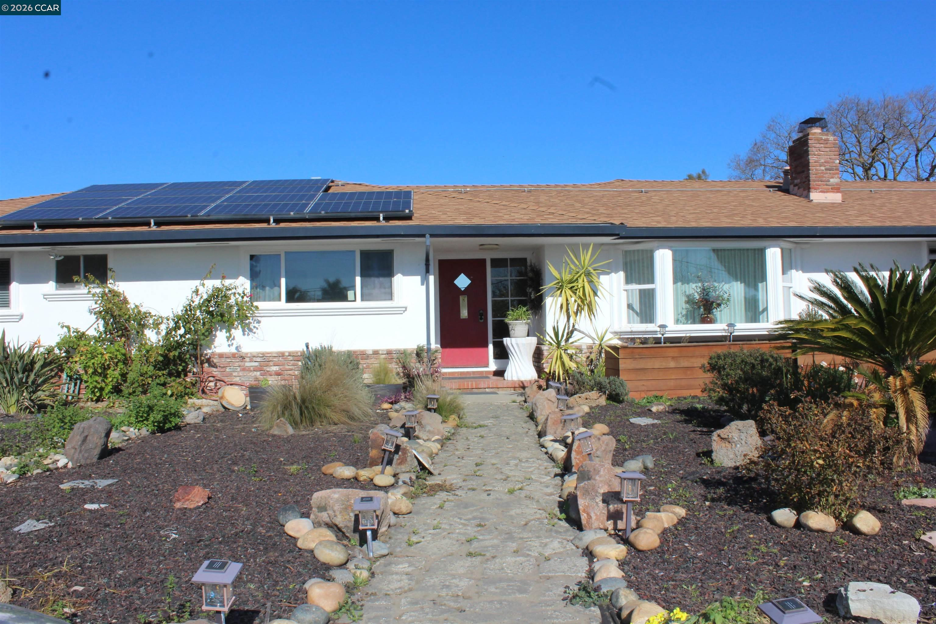 330 West Cypress Road Oakley, CA 94561 - Photo 1 of 59 front view of a house with a yard